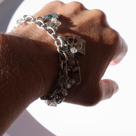 Women`s silver tone charm bracelet. 7 1/2 inches l - Picture 1 of 2